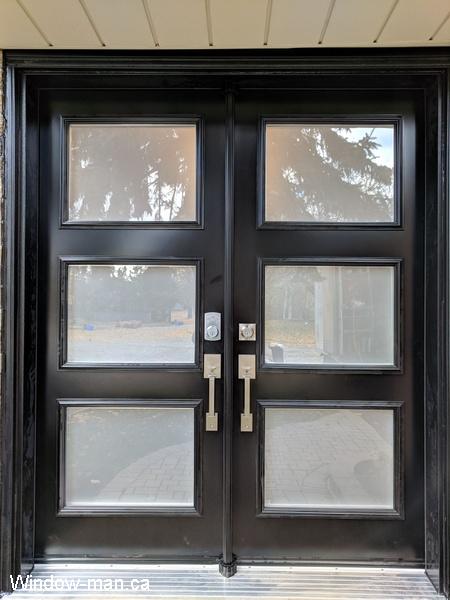 Double front entry insulated black exterior doors installation. Modern shaker style. Acid etched glass. Privacy Glass. 3 lite. Dorothy retro collection shaker style